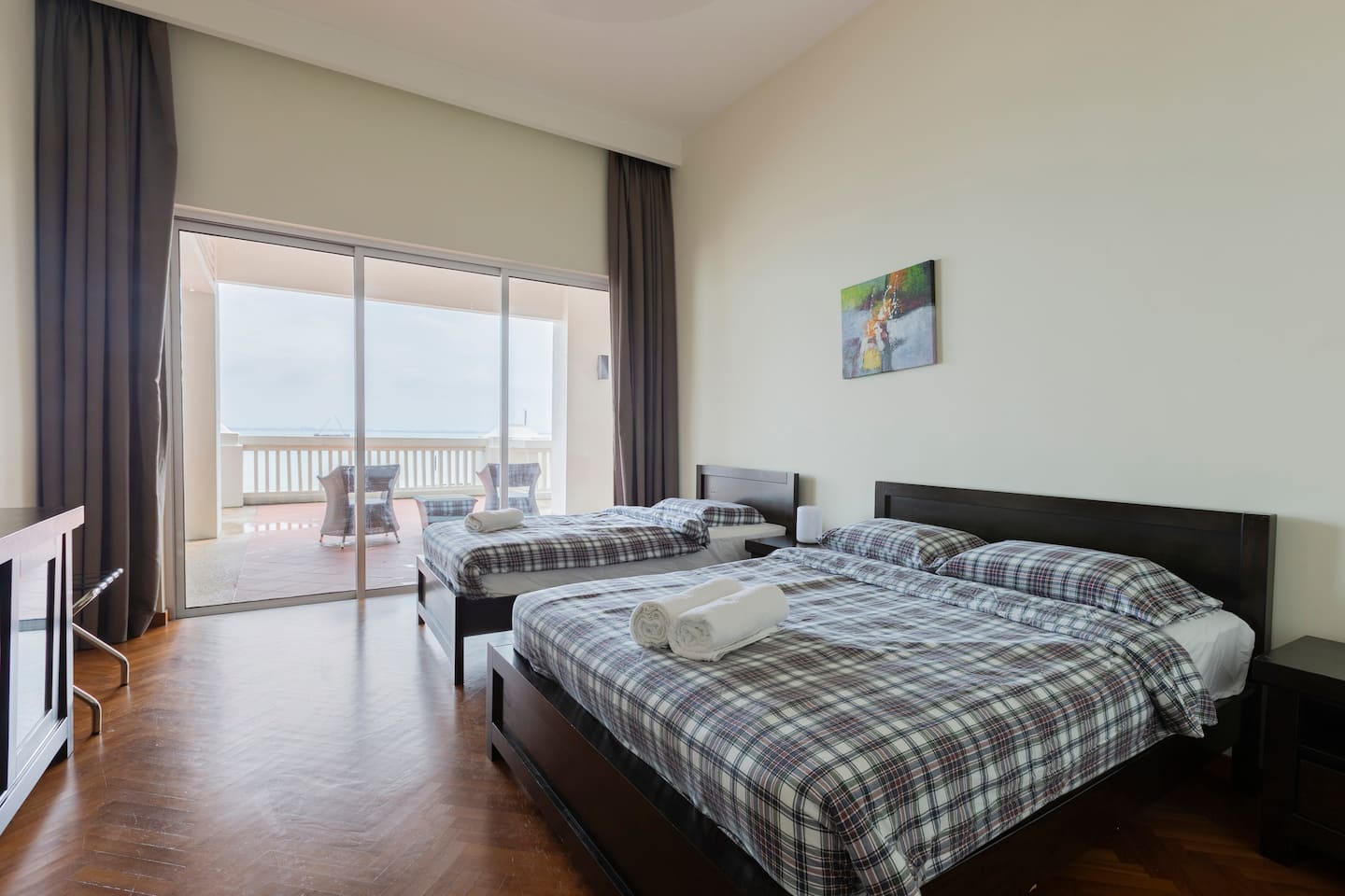 Second bedroom with a queen bed and single bed
